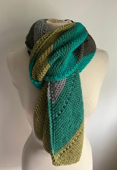 Hand knit unisex scarf Knitted in diagonal in various tone of green and gray Total length 74 inches Wide 12 inches Jackson Heights, Scarf Knitted, Knit Wear, Green And Gray, Diagonal Stripes, Wool Scarf, Knit Scarf, Scarf Wrap, Hand Knitting