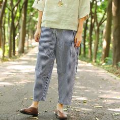 Main Material: CottonClothing Detail: Stripe,PocketsStyle: CasualWaist: Elastic WaistSeason: Spring,AutumnMain Color: Blue And WhiteLabel Size XXL(Fit for EU 42-44,US12-14,UK16-18,AU16-18,NZ16-18)Length: 88.00 cm/ 34.65 "Waist: 78.00 cm-96.00 cm/ 30.71 "-37.80 "Hips: 122.00 cm/ 48.03 "Leg Opening: 36.00 cm/ 14.17 "Leg: 74.00 cm/ 29.13 "Front Crotch: 33.00 cm/ 12.99 "Back Crotch: 35.00 cm/ 13.78 "The model height:165cm,weight:48kg,bust:82cm,waist:66cm,hips:87cmusually wear US Middle sizePS:1.The Non-stretch Striped Pants With Pockets, Spring Baggy Pants With Welt Pockets, Casual Striped Pants With Side Pockets, Baggy Striped Pants With Pockets, Baggy Striped Bottoms For Spring, Spring Striped Bottoms With Pockets, Striped Spring Bottoms With Pockets, Casual Striped Bottoms With Side Pockets, Striped Straight Leg Bottoms With Pockets