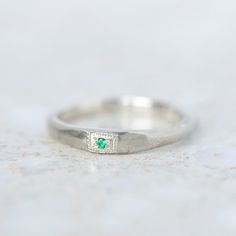 Our Apollo ruins ring has been set with a bright natural emerald. Stone measures 1mm. Band width 1.5- 2mm Weight 1.5g (approximately) Pictured here with a matte finish. For a polished finish please leave a note at checkout. Silver Emerald Ring, Diamond Stacking Rings, Silver Stacking Rings, Natural Emerald, Stacking Ring, Emerald Ring, Stacking Rings, Blue Sapphire, Sterling Silver Rings