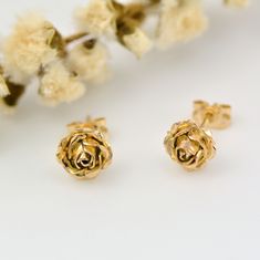 Rose Earrings, Gold Flower Earrings, 9k Gold Stud Earrings Dainty handcrafted solid gold rose stud earrings. They would make a perfect anniversary gift. * Material: 9ct Rose or Yellow eco-gold * Size of Rose: Approx. 0.8cm (0.3in) diameter * Finish: Choose from: 9ct rose, yellow gold or white gold * Earring Type: Stud Earrings with butterfly back * Ready to Ship in 5 business day * Made in the United Kingdom Please allow for slight variations in size as these earrings are completely handmade and Cheap Everyday Rose Gold Earrings, Cheap Single Flower Earring, Cheap Rose Earrings, Affordable Rose Gold Flower Earrings, Cheap Rose Gold Piercings For Gifts, Delicate Flower Earrings Cheap, Simple Rose Earrings, Cheap Rose Gold Metal Flower Earrings, Cheap Rose Gold Flower Earrings For Spring