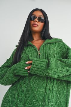 This long sleeve dress is constructed from a knit fabric, featuring a quarter zip closure and intricate braiding. Product details: Fit: Model is 5'9" and is wearing a size small. Fabric Contents: 100% Acrylic Product ID: WD15294 Green Knitted Sweater Dress For Fall, Green Half-zip Fall Sweater, Green Quarter Zip, Acrylic Product, Green Knit Sweater, Quarter Zip Sweater, Knit Sweater Dress, Zip Sweater, Green Color