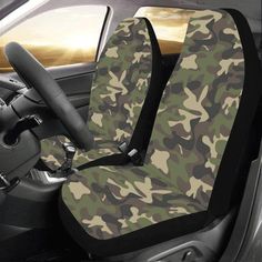 a car seat cover with flowers on the front and back seats in camo print