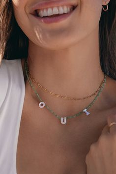 Fluent in french <3 Everyday Green Beaded Necklaces, Everyday Green Beaded Chain Necklace, Green Adjustable Chain Charm Necklace For Everyday, Green Letter Beads Necklace, Adjustable Green Beaded Necklaces With Letter Beads, Adjustable Green Beaded Necklace With Letter Beads, Green Necklace With Letter Beads For Gift, Green Charm Necklace With Adjustable Chain, Adjustable Green Charm Necklace