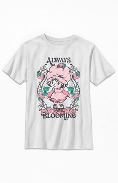 Online Only! Enjoy some sweet style brought to you by the adorable Kids Always Blooming Strawberry Shortcake T-Shirt. This tee has a crew neckline, short sleeves, a standard fit, and retro graphics printed on the front.


	Crew neckline
	Short sleeves
	Standard fit
	Front graphic
	100% Cotton
	Machine washable Retro Character Print T-shirt For Spring, Cute Crew Neck T-shirt, Cute Funny Print T-shirt, Sweet Pink T-shirt With Cartoon Print, Sweet Cartoon Print Crew Neck T-shirt, Sweet Style Crew Neck T-shirt With Cartoon Print, Sweet Short Sleeve Cotton T-shirt, Sweet Cotton T-shirt With Short Sleeves, Sweet Style Short Sleeve Cotton T-shirt