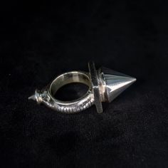 Here is one very nice Tuareg spike ring, it also looks great as a gothic ring, which ever style you prefer it is a great  gift or for any occasion. This boho style piece of jewelry looks excellent on any gender's hand, so treat yourself or a loved one to a very unique item. I also offer custom wooden ring boxes (see in listings in my shop) which would go well with this ring. This version is made out of silver, cast as a single piece of metal, so no glues or soldering, making it very sturdy and d Punk Style Metal Open Ring Jewelry, Punk Style Metal Open Ring, Silver Punk Jewelry With Metal Ring, Punk Style Silver Jewelry With Metal Ring, Gothic Style Jewelry Metal Ring As Gift, Silver Punk Style Metal Ring, Gothic Silver Metal Rings, Silver Gothic Rings In Metal, Adjustable Gothic Ring Jewelry