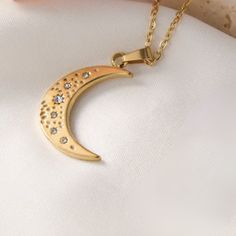 Indulge in the celestial beauty of our Lucy pendant. Crafted with delicate details, this exquisite moon pendant is a timeless piece that will elevate any outfit. Let its ethereal charm transport you to the moonlit sky and add a touch of glamour to your look. Antiqued effect: 18K Gold plate. Items may vary from image. Moonlit Sky, Delicate Details, Moon Pendant, Timeless Pieces, 18k Gold, Gold Plate, Moon, Pendant, Gold