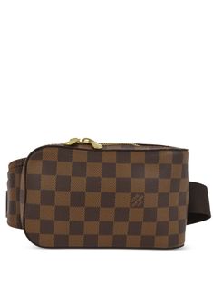 circa 2005 brown signature Damier Ebène canvas adjustable waist strap two-way zip fastening main compartment internal logo patch gold-tone hardware Purchasing this item continues its narrative and reduces the environmental impact by avoiding the use of new resources needed to make the product from scratch, such as water, materials and electricity, and avoiding additional manufacturing impact. Learn more about what makes a product Conscious on our Conscious Criteria page Designer Travel Belt Bag With Detachable Strap, Designer Belt Bag With Detachable Strap For Travel, Monogram Canvas Belt Bag With Detachable Strap, Designer Monogram Canvas Crossbody Belt Bag, Brown Monogram Canvas Crossbody Belt Bag, Classic Brown Monogram Canvas Belt Bag, Luxury Monogram Canvas Belt Bag With Detachable Strap, Classic Monogram Canvas Belt Bag With Removable Pouch, Monogram Canvas Crossbody Belt Bag For Travel