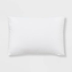 a white pillow on a white background