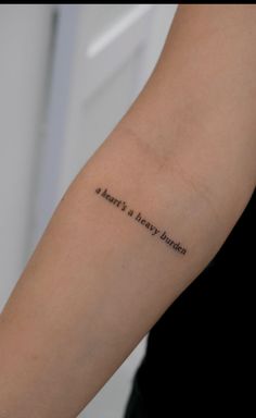 a woman's arm with a quote on it that says, always a happy day