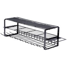 a black metal shelf with two pairs of skis on the bottom and one pair of skis below it