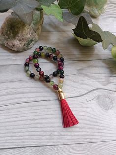 Mini Japa mala with 45 6mm fire-treated agate beads for sacred agesta numerical codes. Mini Japa mala of 45 6 mm agates, made with elastic, offering great resistance and durability. In addition, it makes it easier to slide the beads between your fingers. Includes a beautiful tassel in the same color as the agates. Agates improve concentration and thinking, with harmonizing energy that promotes healthy relationships and opens communication skills. Agate promotes inner stability, promoting security and self-confidence. Stabilizes the aura, eliminating and transforming negative energy into positive. In japa mala it is sent in a bag so you can take it wherever you want. It is recommended not to spray it with perfumes and lotions. Yoga Necklace, Improve Concentration, Meditation Yoga, Agate Beads, Communication Skills, Negative Energy, Healthy Relationships, Tassel Necklace, Lotion