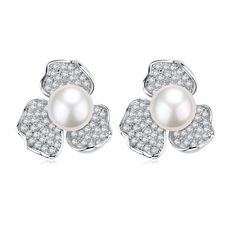 5-5.5mm Cubic Zirconia Floral Pearl Earrings Experience the elegance of our 5-5.5mm Cubic Zirconia Floral Pearl Earrings. With 3 cubic zirconia petals and a freshwater button pearl, these floral ear studs are the perfect combination of sophistication and beauty. Made with 925 sterling silver, these earrings are sure to be a timeless addition to any jewelry collection. Enjoy a touch of luxury with every wear. Product Details Material: 925 Sterling Silver Pearl Type: Freshwater Pearls Pearl Size: Approximately 5-5.5mm Pearl Colors: White Pearl Characteristics: High Luster, Flawless, Button Shape Design: Floral Style: Elegant, Refined, High-Quality Classic Flower-shaped Cubic Zirconia Earrings, Classic Flower-shaped Pearl Earrings For Formal Occasions, Elegant Silver Pearl Earrings With Flower Shape, Elegant Silver Pearl Earrings In Flower Shape, Classic White Cubic Zirconia Flower Earrings, Pearl House, Golden South Sea Pearls, Mabe Pearl, Purple Pearl