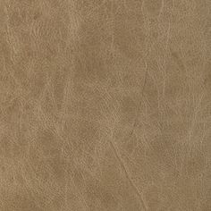 a brown leather textured surface that looks like it could be used as a background or wallpaper