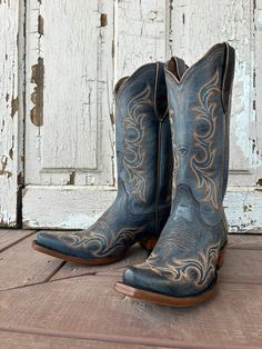 A nod to traditional Western style, Hazen pairs a walkable heel with all-over stitching. It's a works-with-everything boot you can dress up (say with a flowy, romantic dress) or down (a graphic tee and jeans). Shaft Height - 12" Circumference - 14" Heel - 1.5" X Toe ATS® technology provides ergonomic support on uneven terrain Leather lining Hand nailed, color stained Veg Tan leather sole Resoleable Goodyear leather welt construction Five-row stitch pattern 5.24 Western Fall Boots With Heel Tab, Western Boots With Square Toe And Heel Pull Tab, Western Blue Boots With Round Toe, Blue Western Boots With Round Toe, Western Boots With Heel Tab And Round Toe, Fitted Boots With Stacked Heel And Snip Toe, Blue Snip Toe Boots With Reinforced Heel, Fitted Leather Sole Boots With Closed Toe, Western Style Blue Boots With Reinforced Heel