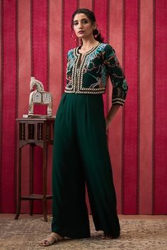 Bottle green plain flared jumpsuit. Paired with a crepe thread and bead embroidered jacket with a front zipper. - Aza Fashions Embroidered Fitted Jumpsuits And Rompers For Festive Occasions, Fitted Embroidered Jumpsuit For Festive Occasions, Festive Embroidered Fitted Jumpsuits And Rompers, Jumpsuit With Jacket, Plain Jumpsuits, Flared Jumpsuit, Green Plain, Green Thread, Flare Jumpsuit