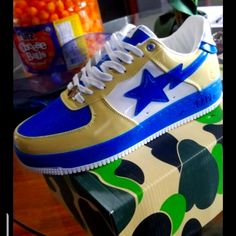 New With Box Bathing Ape Sta Low Yellow And Blue Top Sneakers. Size 11 Orange Bapesta Shoes, Designer Gold Low-top Custom Sneakers, Designer Gold Custom Low-top Sneakers, Designer Blue Low-top Sneakers, Designer Blue Lace-up Sneakers, Designer Blue High-top Custom Sneakers, Designer Blue Low-top Custom Sneakers, Designer Blue Custom Sneakers With Round Toe, Bapesta Shoes