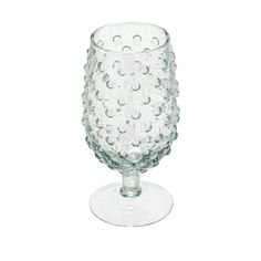 This glass hobnail stemmed drinking glass is a beautiful and functional piece of glassware that will add a touch of elegance and charm to the table. It features a clear glass color with a hobnail texture that creates a stunning visual effect. The glass also has a stemmed base that gives it a graceful and refined look. Use it to serve water, juice, wine, or any other beverage of choice, this glass will complement any farmhouse, French country, coastal, or cottagecore style decor. It is made of hi Farmhouse French Country, Drinking Glass Sets, Cottagecore Style, Creative Co Op, Drinking Glass, Glass Color, Drinking Glasses, Visual Effects, Glass Set