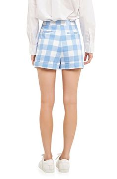 Find ENGLISH FACTORY Gingham Trouser Shorts on Editorialist. A colorful gingham print amplifies the retro-inspired flair of eye-catching shorts styled with cool cuffed hems. Lined 65% polyester, 35% rayon Hand wash, dry flat Imported Chic Plaid Short-length Bottoms, Chic Plaid Short Bottoms, Chic Plaid Cotton Shorts, Plaid Cotton Shorts For Day Out, Gingham Cotton Shorts For Day Out, Cotton Gingham Shorts For Day Out, Trendy Gingham Summer Shorts, Trendy Gingham Shorts For Summer, Plaid Shorts For Summer Day Out