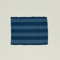 a piece of blue and white striped fabric