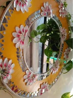 a mirror that has flowers on it