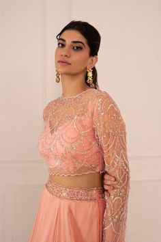 Editor's Note Featuring Peony Pink Embroidered Lehenga Set Fabric: Silk Organza, Net Color: Pink Embroidery Details: Zardozi Hand Embroidery Care: Dry Clean Only   About the Designer Mani Bhati... Unstitched Embellished Blouse Piece For Wedding, Unstitched Embellished Wedding Blouse Piece, Wedding Embellished Unstitched Blouse Piece, Embroidered Sets For Diwali Reception, Embellished Sets For Eid Reception, Embellished Sets For Reception On Eid, Traditional Sets With Floral Embroidery For Reception, Floor-length Embellished Blouse For Wedding, Bollywood Embroidered Sets For Reception