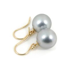 "Classic 14k yellow gold \"Shepherd Hooks\" dangle earrings with organic natural color golden, south sea cultured pearls from Australia. Each of the gorgeous, genuine south sea golden pearls exhibits an excellent high luster and thick nacre with just minimal spots. ------------ Style: Dangle Fastening: Shepherd Hooks. Metal Purity: 14k Solid Yellow Gold Earring Total Length (including pearl): 2.7cm / 1 inch ----------------- Pearl Type: Genuine Tahitian Cultured Pearl. Pearl Origin: French Polyn Elegant Gold Tahitian Pearl Earrings, Classic Gold Tahitian Pearl Earrings, Gold Tahitian Pearl Earrings Gift, Gold Tahitian Pearl Earrings For Formal Occasions, Gold Tahitian Pearl Drop Earrings, Tahitian Pearl Earrings, South Seas, Pearl Types, Tahitian Pearls