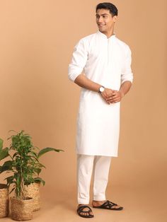 Vastramay Men's White Cotton Blend Solid Kurta with White Pant Set A classic choice for any occasion, this kurta and pant set from Vastramay is crafted from comfortable cotton blend fabric. The kurta features a solid white design, making it versatile and easy to style. Pair it with the included white pants for a complete traditional look. Features: Comfortable cotton blend fabric Solid white design Includes white pants for a complete look Specifications: Brand: VASTRAMAY Color: White Material: C Festive Traditional Kurta With Relaxed Fit, Traditional Relaxed Fit Kurta For Festive Occasions, Casual White Cotton Lawn Suit, White Cotton Kurta With Relaxed Fit, White Cotton Relaxed Fit Kurta, White Cotton Pants For Eid, White Relaxed Fit Cotton Kurta, Unstitched Casual Cotton Lawn Suit, Casual Cotton Traditional Wear For Eid