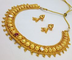 22 karat yellow gold handmade fabulous necklace set with traditional antique  design wedding anniversary bridal rajasthani tribal necklace women's tribal jewelry. Note-Please keep in mind all items may appear larger than actual size in the photos Weight-39.500  grams approx. Metal-22karat yellow gold. brand-handmade. Necklace length-Adjustable necklace with back thread knot. condition-excellent condition jewelry. Type -antique necklace pendant set. makes excellent gift item and collection piece for more information please see the photo's gold jewelry is handmade designer jewelry. so, there can be slight difference in size and weight of the article in the comparison of the description. Ceremonial 22k Gold Meenakari Jewelry, Yellow Gold Round Temple Necklace With Meenakari, Gold Dual-tone Chandbali Kundan Necklace, Gold Dual-tone Kundan Necklace For Wedding, Gold Dual-tone Jewelry For Puja, Heavy Gold Plated Necklace For Festivals, 22k Gold Round Temple Necklace With Meenakari, Yellow Gold Round Kundan Necklace In Temple Style, Ceremonial Yellow Gold Kundan Chandbali Necklace