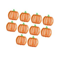 six orange pumpkins are arranged in a circle