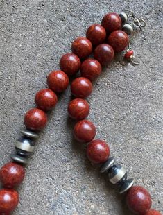 Sterling Silver Red Apple Coral Bead Necklace. 19 inch Classic Red Beaded Jewelry, Classic Handmade Red Necklace, Red Vintage Necklace With 8mm Beads, Classic Red Gemstone Beads Necklace, Classic Red Necklace With Gemstone Beads, Red Vintage Necklaces With 8mm Beads, Red Vintage 8mm Bead Necklaces, Classic Red Necklace With Polished Beads, Classic Red Round Beaded Necklaces