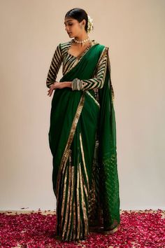 Dark green saree with striped pattern gota work and soft organza pallu. Comes with coordinating gota work blouse. - Aza Fashions Fitted Pre-draped Saree With Gota Work, Green Pre-draped Saree With Gota Work For Eid, Green Pre-draped Saree With Dupatta For Party, Traditional Green Pre-draped Saree With Sheer Dupatta, Anarkali Long Sleeve Pre-draped Saree For Diwali, Green Pre-draped Saree For Eid Party, Green Silk Pre-draped Saree With Gota Work, Festive Green Georgette Pre-draped Saree, Green Pre-draped Saree With Sheer Dupatta For Eid