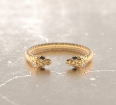 Fab and Sophisticated snake band in Bohemian Chic style. The snake texture inspired by mystical alchemical Ouroboros snake, which is one of the traditional infinity symbols. It has comfort fit and you won't want to take it off! About this item: -Black diamonds 0.03 approx. total carat weight -Stackable -Solid 10K Rose, Yellow or White gold OR -Solid 14K Rose, Yellow or White gold OR -Solid 18K Rose, Yellow or White gold OR -Platinum PLEASE NOTICE: This price is for the ring's sizes up to 8, if y Bohemian Chic Style, Snake Texture, Bohemian Goth, Ouroboros Snake, Engraved Engagement Ring, Bohemian Chic Fashion, Snake Jewelry, Textured Ring, Ring Antique