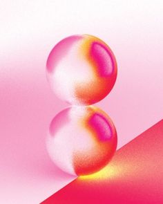 two balls sitting on top of each other in front of a pink and red background