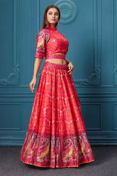 Dance like a diva on sangeet, mehendi, and wedding in this gorgeous red bandhej print silk lehenga with gotta patti work and beautifully decorated borders. Featuring with a beautiful high neck and 3/4th sleeve blouse. Shop online at Pure Elegance or visit our store in the USA. Red Bollywood Choli With Bandhani Print, Semi-stitched Red Choli With Bandhani Print, Red Bandhani Print Choli For Diwali, Red Meenakari Sharara For Reception, Red Bandhani Print Lehenga For Navratri, Red Bandhani Print Semi-stitched Lehenga, Red Anarkali Set With Meenakari For Navratri, Fitted Red Lehenga With Meenakari Details, Red Meenakari Choli For Reception