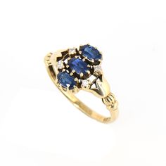 Lotus Design Gold Shank, Vintage Style 9ct Solid Gold Diamond Ring, 9K Antique Sapphire, Women's Victorian Gold Ring, Diamond Sapphire Ring This beautiful Victorian ring is an excellent example of goldsmith work during this period. Superb jewelry was crafted during Victorian/Edwardian/art deco times, displaying a beautiful, timeless design and craftsmanship. The ring is hallmarked for 9ct gold. This beautiful old ring style is from 1900 century , it is in lovely condition. The beautiful band and Cluster Yellow Gold Hallmarked Rings, Yellow Gold Cluster Rings Hallmarked, Yellow Gold Cluster Ring With Hallmark, Victorian Yellow Gold Cluster Rings, Victorian Cluster Yellow Gold Rings, Heirloom Yellow Gold Sapphire Ring, Hallmarked, 14k Gold Cluster Ring Hallmarked, Victorian Gold Ring, Sapphire Jewelry Set