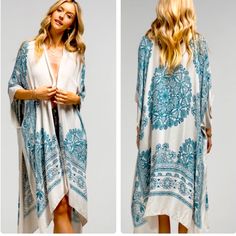 Semi-Sheer Woven Kimono Features An Ornate Mandala Print With Lotus Pattern Border Teal And White. *100% Viscose *Approx. W 40" L 36" Casual Summer Vacation Trendy Birthday Christmas Cruise Party Office Shower '90s Gift Spring Lounge White Boho Print Kimono For Beach Cover-up, White V-neck Kimono For Day Out, White Kimono For Brunch In Summer, Casual Printed White Kimono, Casual White Printed Kimono, White Flowy Long Sleeve Kimono, White Long Sleeve Flowy Kimono, White Kimono With Kimono Sleeves For Brunch, White Kimono For Brunch