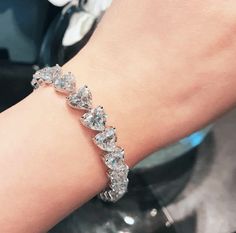 Information Metal: 925 Sterling Silver; Chain Length/Perimeter: 160mm/170mm/180mm; Plating Color: White Gold Gem type: Sona Simulated Diamond Stone Shape: Heart Cut(6*6mm) Number of Stones 24; Stone Color: White Stone Bracelet Diamond, Heart Shaped Diamond, Tennis Bracelet Diamond, 925 Jewelry, Sterling Silver Heart, Tennis Bracelet, Diamond Heart, Lab Diamonds, Pure Silver