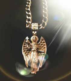 Pendant Angel Guardian will be a wonderful talisman for you and your loved ones. weight of 585 tests in gold 5.2 grams. Larger pendant in silver on the link https://www.etsy.com/listing/757680994/pendant-angel-guardian-with-a-sword?ref=listings_manager_grid Collectible Gold Cross Pendant Necklaces, Collectible Gold Necklaces With Cross Pendant, Gold Spiritual Locket Jewelry And Charms, Gold Spiritual Charms And Jewelry, Gold Spiritual Jewelry And Charms For Blessing, Gold Cross Pendant Jewelry For Blessing, Antique Gold Jewelry For Blessing, Antique Gold Jewelry For Blessing Occasions, Gold Symbolic Collectible Necklace