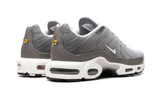 The Nike Air Max Plus SE “Flat Pewter” is a versatile colorway of the retro performance running and lifestyle sneaker with a neutral appearance.  The upper features a grey mesh construction with clear TPU overlays.  A small white jeweled Swoosh appears on each side of the shoe.  A classic yellow “TN” (Tuned Air) badge is found on the heel.  Underfoot, the shoe is mounted on a white foam midsole with visible Air units in the forefoot and heel.  Release date: February 11, 2023 Pewter Shoes, February 11, Air Max Plus, Nike Air Max Plus, Stadium Goods, Air Max, Nike Air Max, Nike Air, Street Wear