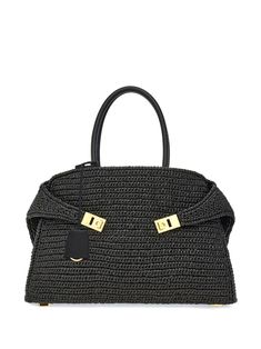 black raffia leather trim interwoven design Gancini flip-lock fastening gold-tone hardware hanging key fob adjustable side straps clasp fastening two top handles main compartment internal card slots Raffia Tote Bag, The Hug, Woven Raffia, Chanel 2, Ballet Flat Shoes, Black Tote Bag, Key Fob, Leather Trim, Womens Tote Bags