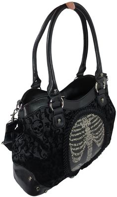 This Gothic black handbag has an all-over skull and ivy pattern in a soft velveteen flock material. The design includes flocked cameo skeleton detailing on the front with a pleated frame of ribbon. The bag is equipped with detachable shoulder straps that can be adjusted and the handles have metal skull studs. There is a zip opening that reveals inner pockets. A zip up back pocket completes the design.The design of the Black Flocked Cameo Skeleton Handbaginclude:* All-over Skull & Ivy Pattern* So Ribcage Skeleton, Grunge Lookbook, Gothic Bag, Goth Steampunk, Queen Black, Metal Skull, Black Goth, Black Handbag, Vintage Purses