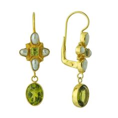 Renaissance jewelers were inspired by the multitude of gems pouring into European ports. This peridot and cultured pearl cross dangles a gleaming peridot stone. 24k gold over sterling silver, European backs. Size: 1 1/2 inches. Apartment 2023, Peridot Earrings, Style 2023, Peridot Stone, Laurel Burch, Ancient Jewelry, Knot Earrings, Moonstone Necklace, Christmas Jewelry