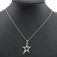 Dazzling in design, this Y2K Star Pendant Necklace features an intricate star pattern in beautiful zinc alloy metal. A link chain completes the look for a stunning, eye-catching piece of jewelry. DETAILSPattern Type: StarMetals Type: Zinc alloyMaterial: MetalChain Type: Link Chain Jewelry Y2k, Diamond Star Necklace, Pentagram Necklace, Pentagram Pendant, Y2k Accessories, Chain For Women, Star Chain, Star Pendant Necklace, Mens Jewelry Necklace