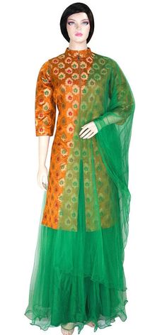 This extravagant long kurti & lehenga set consists of a banarasi 3/4 Sleeves kurti with multi color zari betel leaf motif embroidery & net skirt & dupatta. It's kurti is designed in jacket style with front open & a concealed zipper. This lightweight outfit comes with a comfortable elastic waist. Perfect for any occasion! Lining: Taffeta Stitching: Fully Stitched Care: Dry clean recommended Message: Please feel free to contact us to customize this outfit or add a matching stole/dupatta. Note: Product color may slightly differ from the image. Please note the we offer expediate shipping, that only speeds up the shipping time, our processing time will not be effected. Traditional Fitted Floor-length Palazzo Set, Semi-stitched Floor-length Traditional Wear For Festive Occasions, Semi-stitched Floor-length Traditional Wear For Festive, Floor-length Brocade Choli With Dupatta, Semi-stitched Art Silk Choli For Eid, Semi-stitched Floor-length Salwar Kameez For Transitional Seasons, Anarkali Choli With Self Design For Eid, Wedding Palazzo Set With Dupatta In Jamawar, Wedding Jamawar Palazzo Set With Dupatta