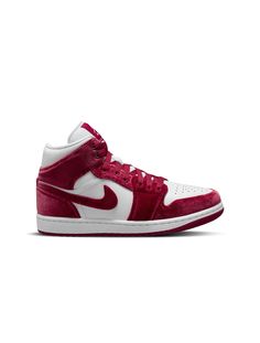 Air Jordan 1 Mid SE Women's Shoes: Combine heritage Jordan colors with soft velvet in the special edition Air Jordan 1 Mid SE. Real leather adds durability, Nike Air technology offers cushioned comfort, and the rubber outsole ensures durable traction, all while elevating your style with a touch of luxury. High-top Suede Sneakers With Branded Heel Counter, Burgundy Leather Sneakers For Sports, Red Suede Sneakers With Boost Midsole, Burgundy Sneakers With Cushioned Footbed And Round Toe, Burgundy Leather Sneakers With Cushioned Footbed, University Red Leather High-top Sneakers With Round Toe, Red Suede Sneakers With Cushioned Footbed, University Red Leather High-top Sneakers With Cushioned Footbed, University Red Leather Sneakers With Cushioned Footbed