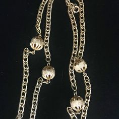 "This long lightweight delicate chain necklace is an antiqued gold color. The long cable chain measures 50\" inches and can be doubled over easily. Spaced throughout the chain are seven, open work filigree antiqued gold beads that measure .5 inch. It has a nice weight to it and light weight. There are no makers marks on this necklace. This metal necklace is circa 1950 and made by a high end costume jewelry maker of the time.  The first half of the 20th century was the heyday for well made costume jewelry sold from fine department stores to Woolworth, usually made in Europe or the United States. The manufacture and quality of costume jewelry deteriorated in the latter part of the century making this era the last with enduring products.  This piece of jewelry is sent in a bubble pack envelop Luxury Antique Jewelry With Wheat Chain, Luxury Vintage Wheat Chain Necklace, Costume Jewelry Makers, Made Costume, Vintage Gold Chain, Pyrite Pendant, Czech Glass Necklace, Necklace C, Metal Necklace