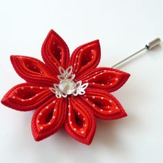 A flower is made in the technique of tsumami kanzashi. Flower is made from grosgrain and satin ribbons . crystal. Flower's d ~ 2 inches (5 cm). More lapels see here: https://www.etsy.com/shop/JuLVa?section_id=11777522&ref=shopsection_leftnav_4 At your request can be made a fower of a different color combinations. My handworks can be a unique gift for you, your family and friends! For more items, please visit my shop home: http://www.etsy.com/shop/JuLVa Please be aware that orders are sent via st Red Handmade Flower Brooches For Wedding, Red Flower Lapel Pin For Wedding, Red Handmade Flower Brooches, Handmade Red Flower Brooches, Red Flower-shaped Brooch With Handmade Flowers, Holiday Hair Clips, Tsumami Kanzashi, Flower Boutonniere, Flower Lapel