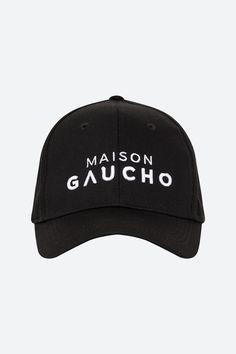 This one’s a literal hat tip to the studios where Gaucho - Buenos Aires designs are conceived. The high-quality woven cotton canvas cap ups the ante for logo lovers, with monochrome stitching on both the front and back. The adjustable leather band and horseshoe embossed metal clasp brings longevity and a hit of luxury to a minimalist look. Gaucho Hat, Cotton Six-panel Hat With Logo Print, Six-panel Cotton Hat With Logo Print, Hat Tip, White Embroidery, Leather Band, Cotton Weaving, Trucker Hat, Cotton Canvas