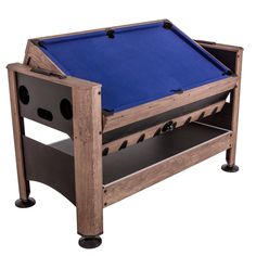 a pool table that is made out of wood and has blue cloth on the top