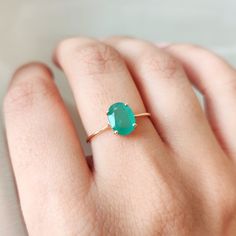 This stunning ring is set in 14k Solid Yellow Gold with Natural Emerald with utmost precision. It is an unique dainty gemstone ring for nearly every occasion and is completely hassle-free jewelry. 🔷GEMSTONE:  Emerald is often associated with love and romantic relationships. It is believed to promote love, loyalty, and unity, making it a popular choice for engagement and anniversary jewelry. Emerald is often associated with abundance and financial success. It is believed to attract prosperity an Elegant Oval Solitaire Gemstone, Emerald Oval Cabochon Ring As A Gift, Oval Emerald Gemstone Ring Fine Jewelry, Oval Emerald Gemstones With Prong Setting, Oval Emerald Ring Gift, May Birthstone Rings In Oval Cabochon Shape, Solitaire Oval Cabochon Jewelry As Gift, May Birthstone Oval Cabochon Rings For Gift, Oval Birthstone Ring Gift